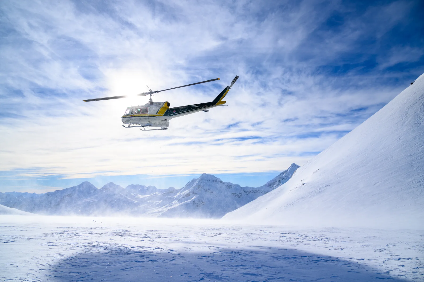 Helicopter landing in the mountains